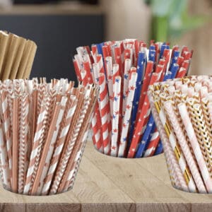 Replay Products | Eco-friendly Paper Straws in a variety of colors on a wooden table.